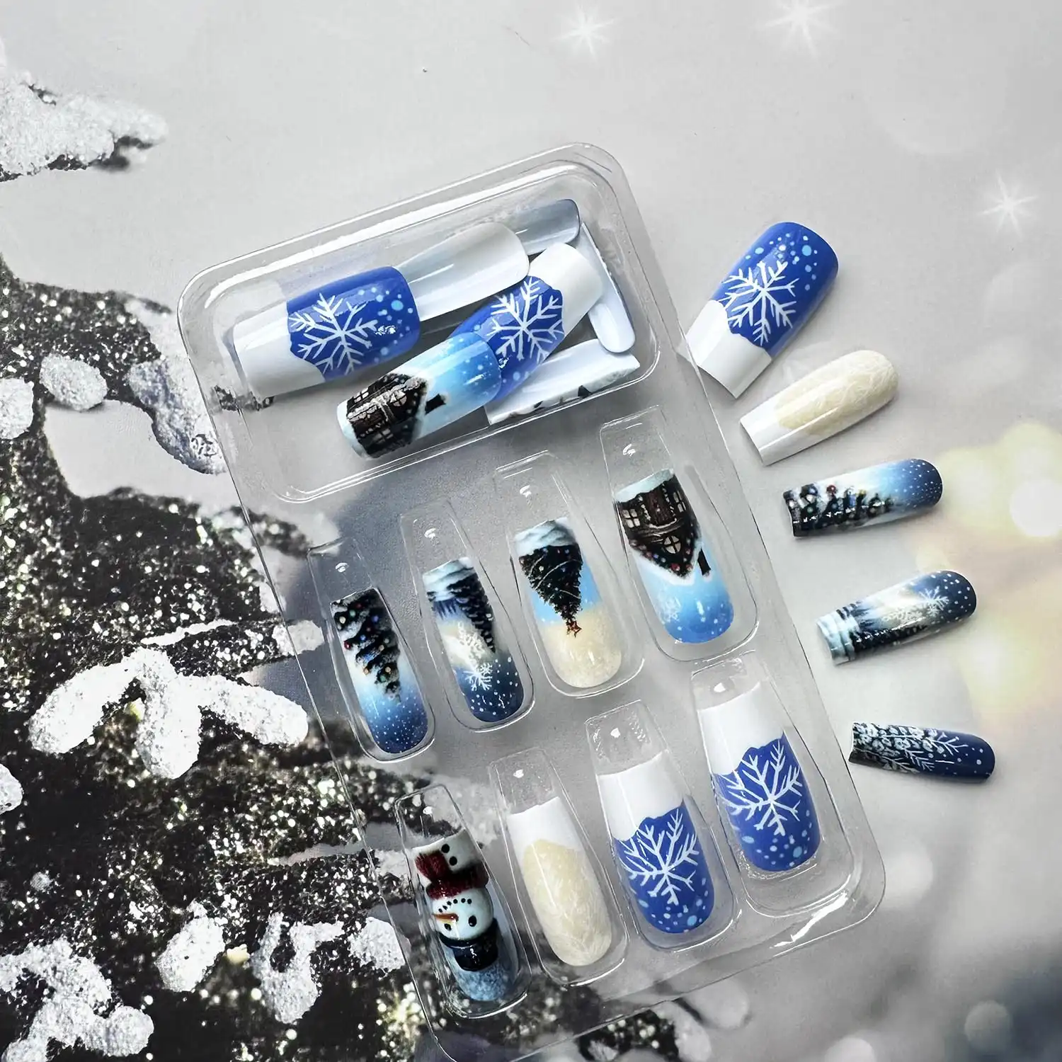 24Pcs Christmas Square Press on Nails Blue Medium Length Fake Nails with Christmas Tree Snowman Snowflakes Patterns Design